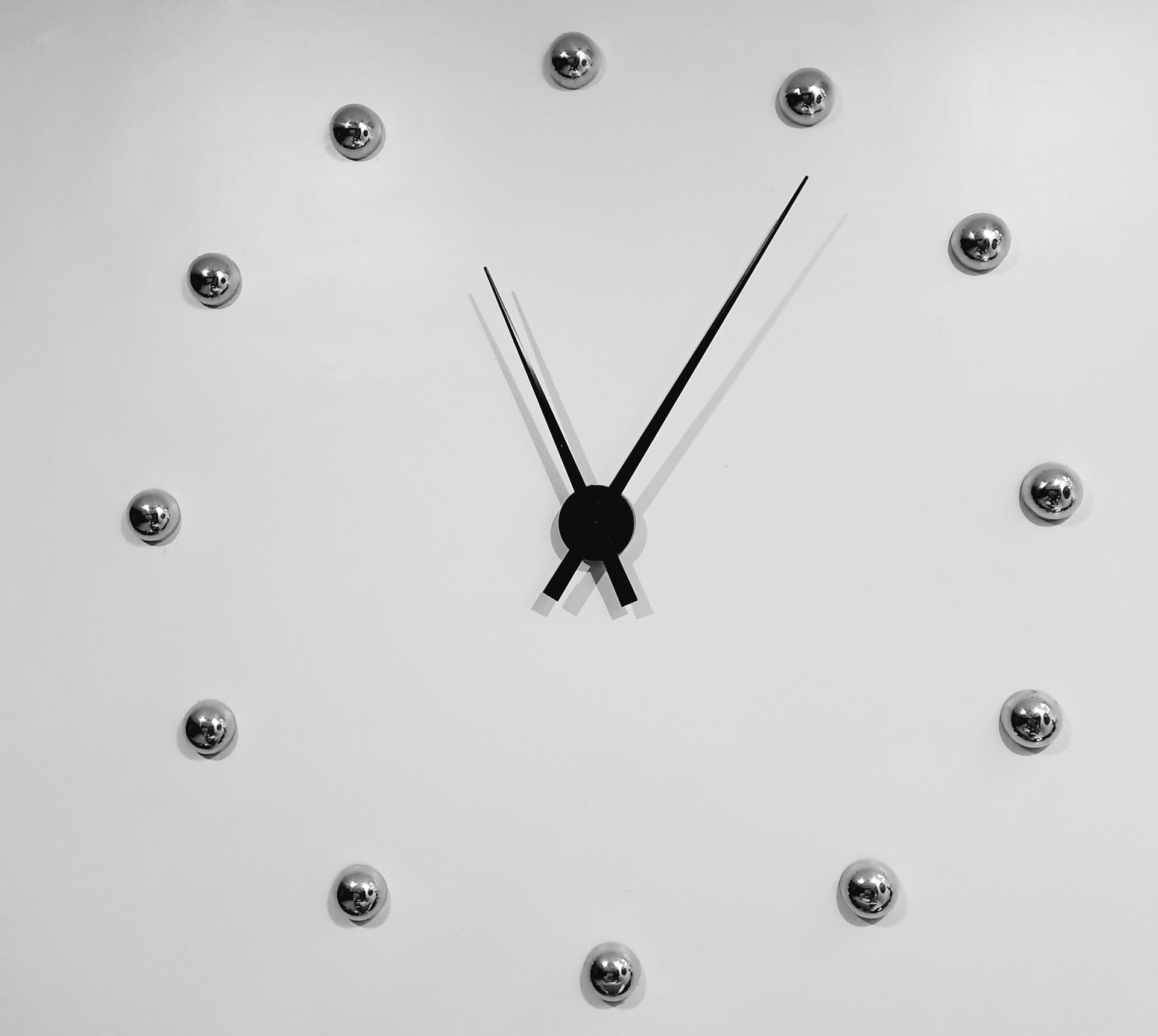 a clock hanging from the ceiling